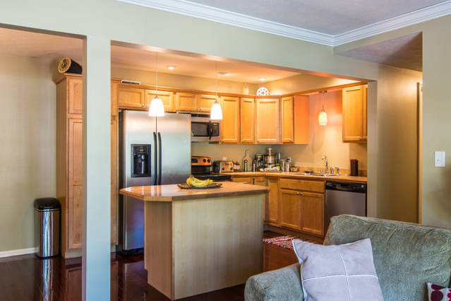 The second kitchen after renovation, opened up with an island